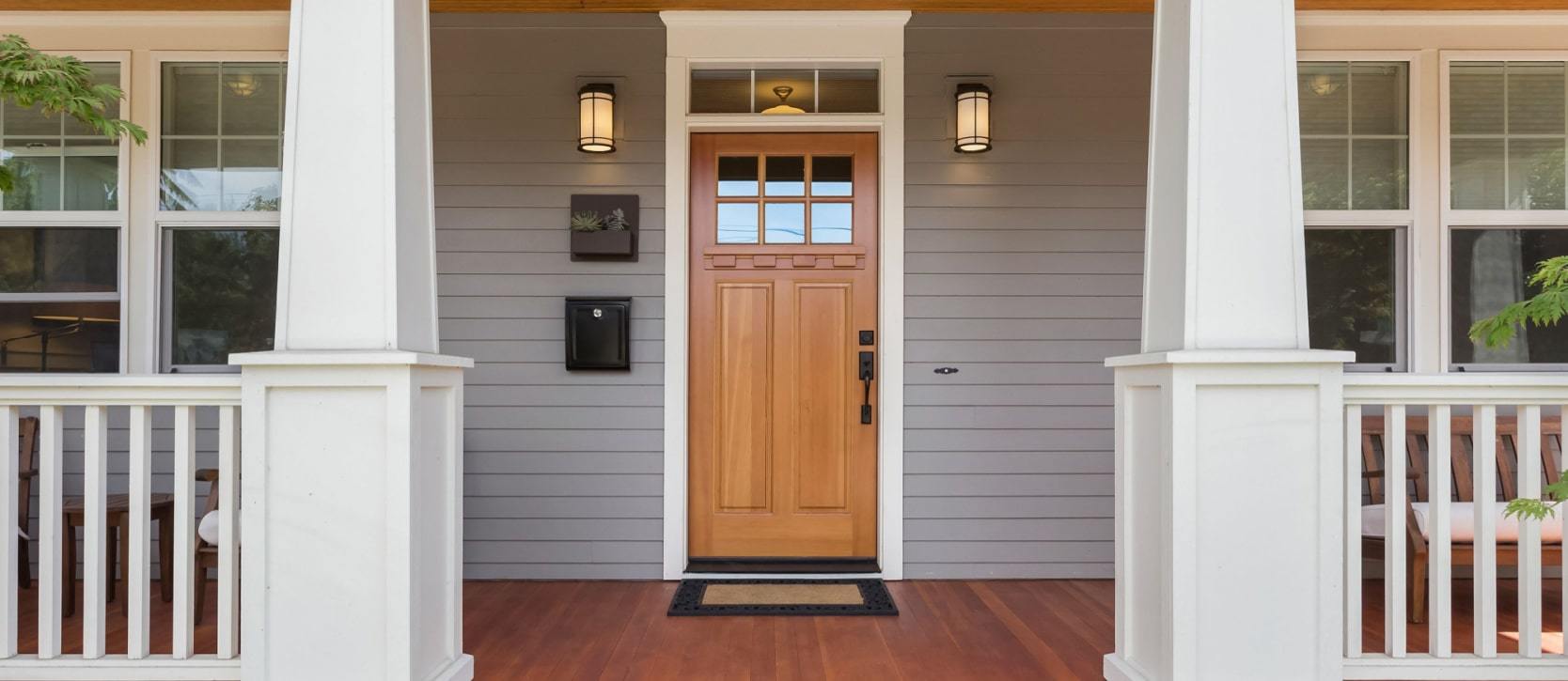 Front door on a front porch of a residential home